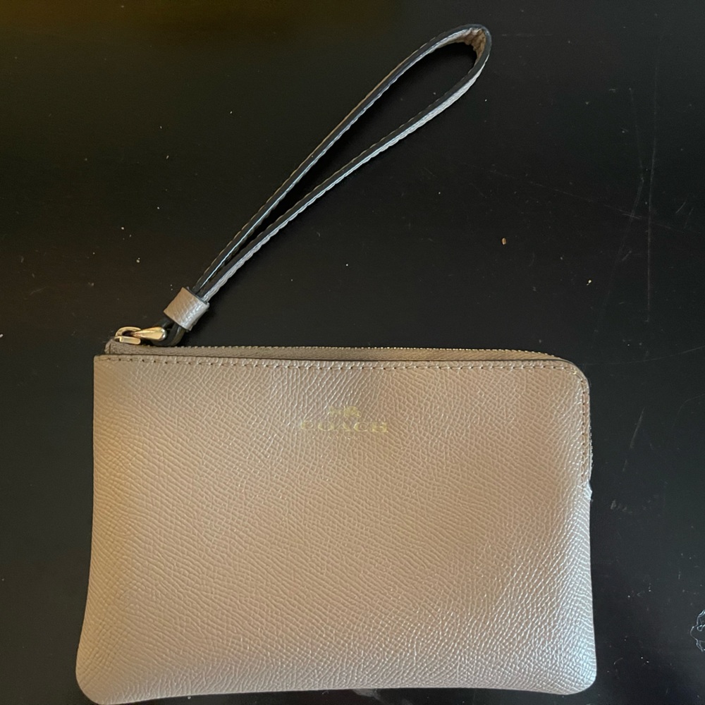 Coach wristlet. Tan